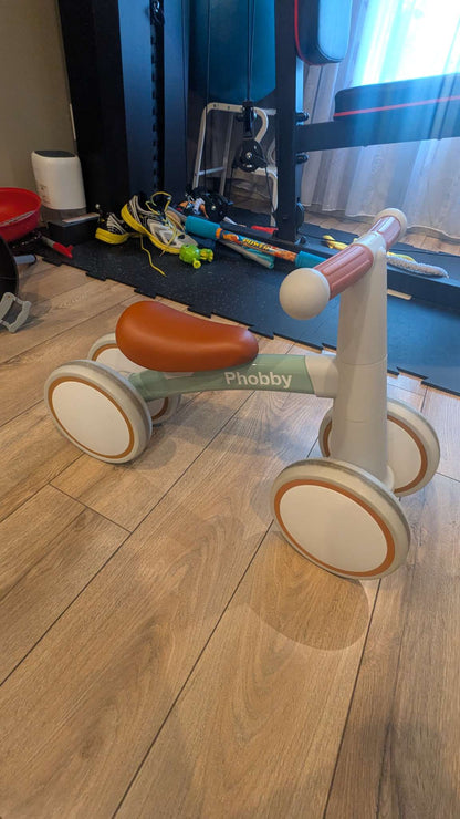 2 Toddler bikes - one with adjustable back wheels