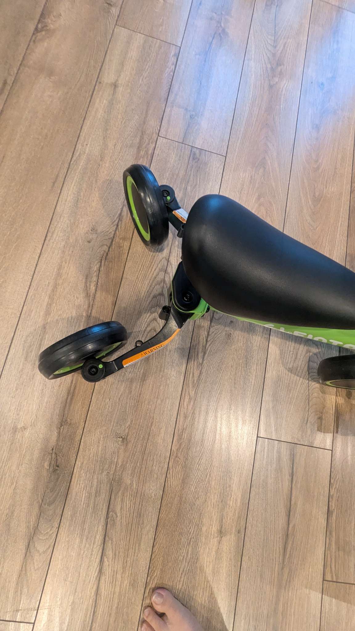 2 Toddler bikes - one with adjustable back wheels