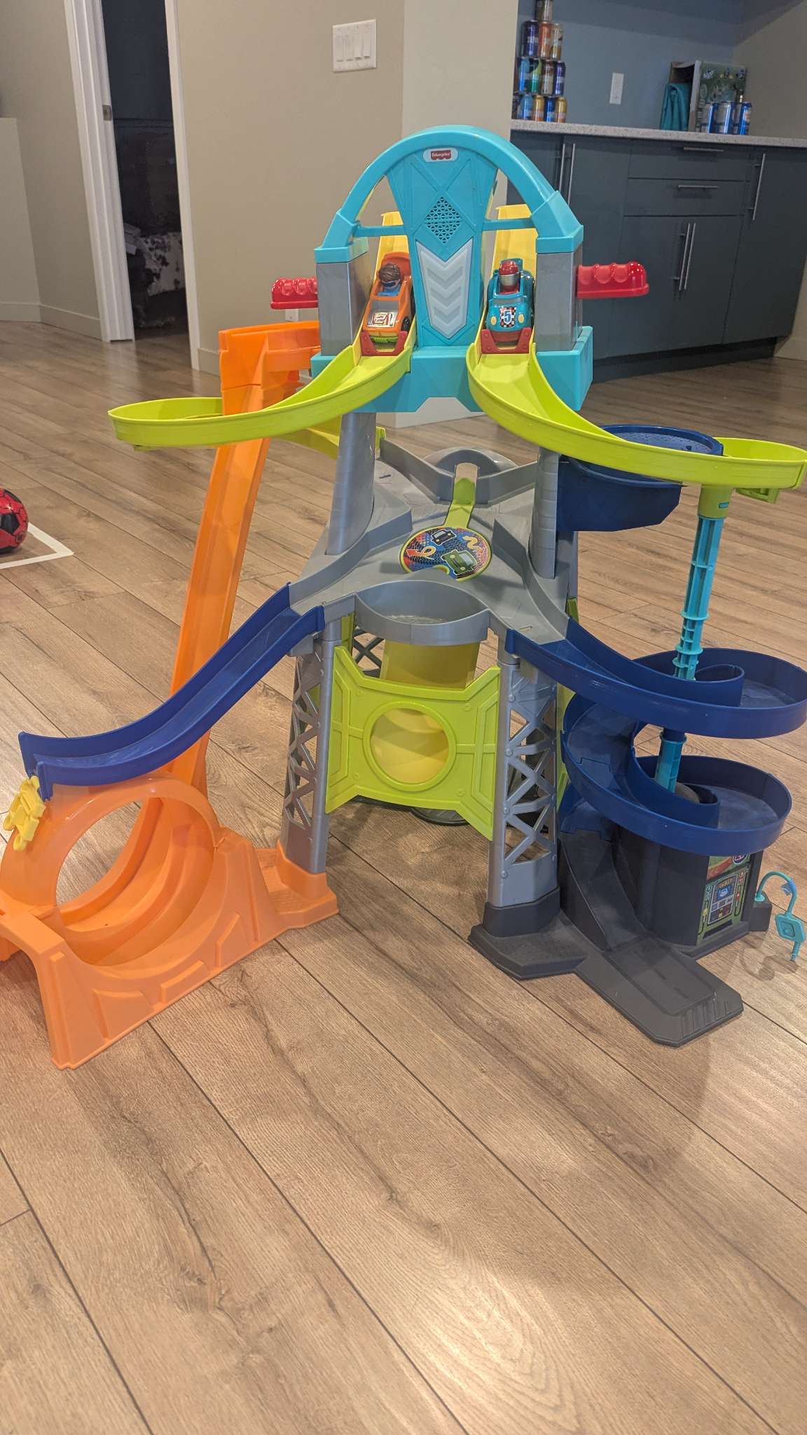 Fisher price race track with 2 cars