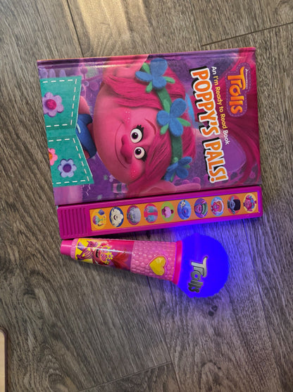 Trolls book and microphone