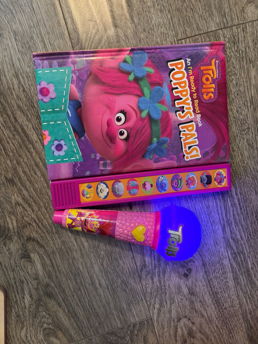 Trolls book and microphone