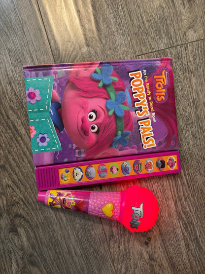 Trolls book and microphone
