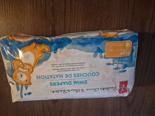 18 medium PC disposable swim diapers, Kids 9 Month (6-9M)