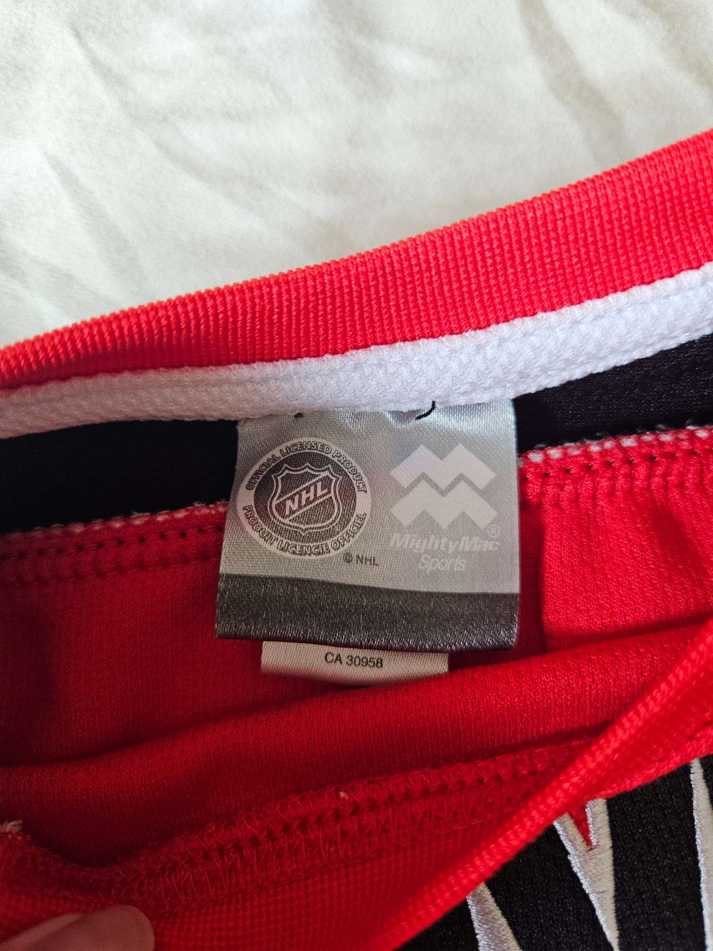 Official Calgary Flames Jersey size 2T , Kids 2T