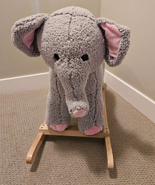 Rocking Elephant, sings "Do your ears hang low"