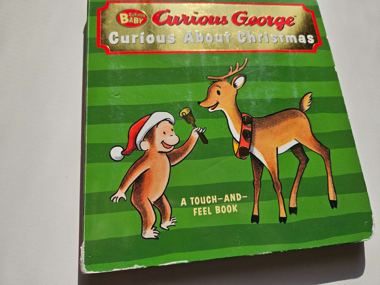 Set of 3 Christmas Books (Curious George, look and find, Santa Snores)