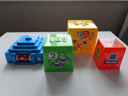 Fisherprice laugh and stack surprise presents