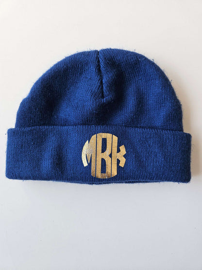 Navy blue touque with MBK in gold font