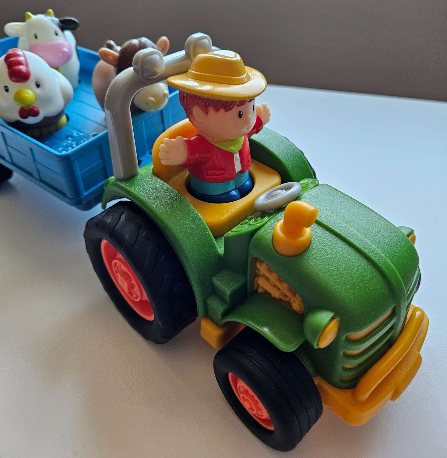 Tractor, farmer and animals toy