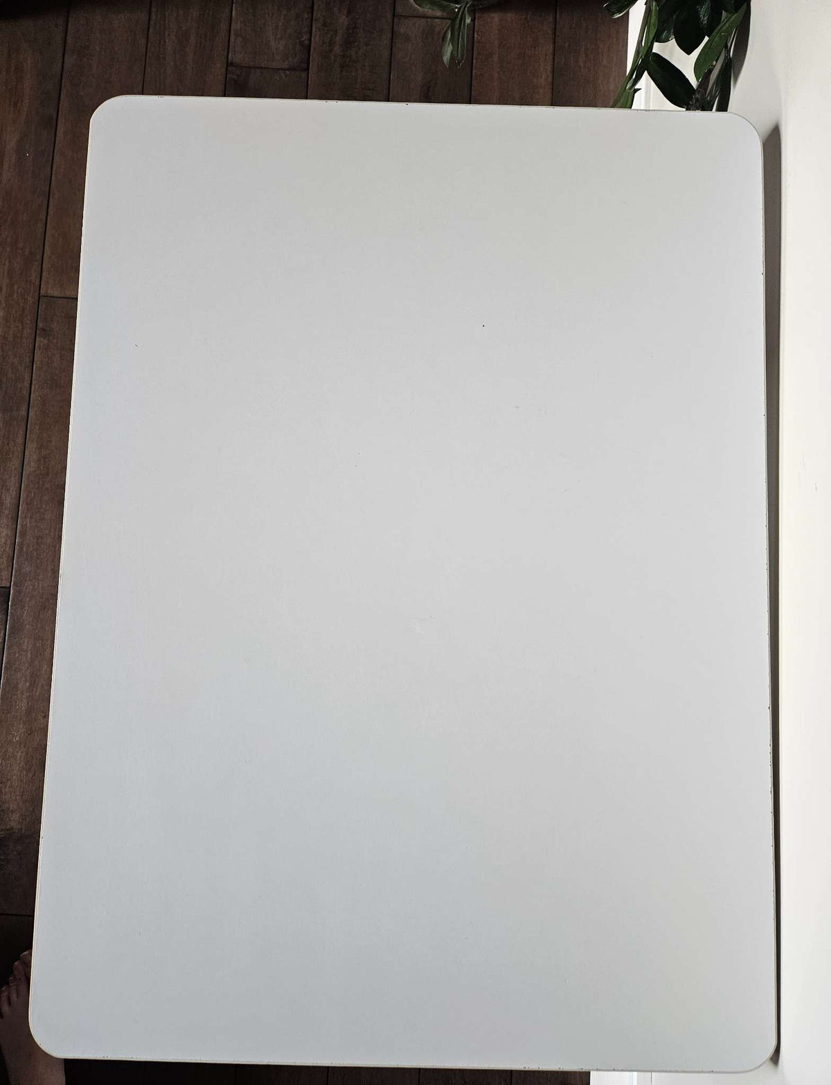 White Kidcraft heart table with storage shelves