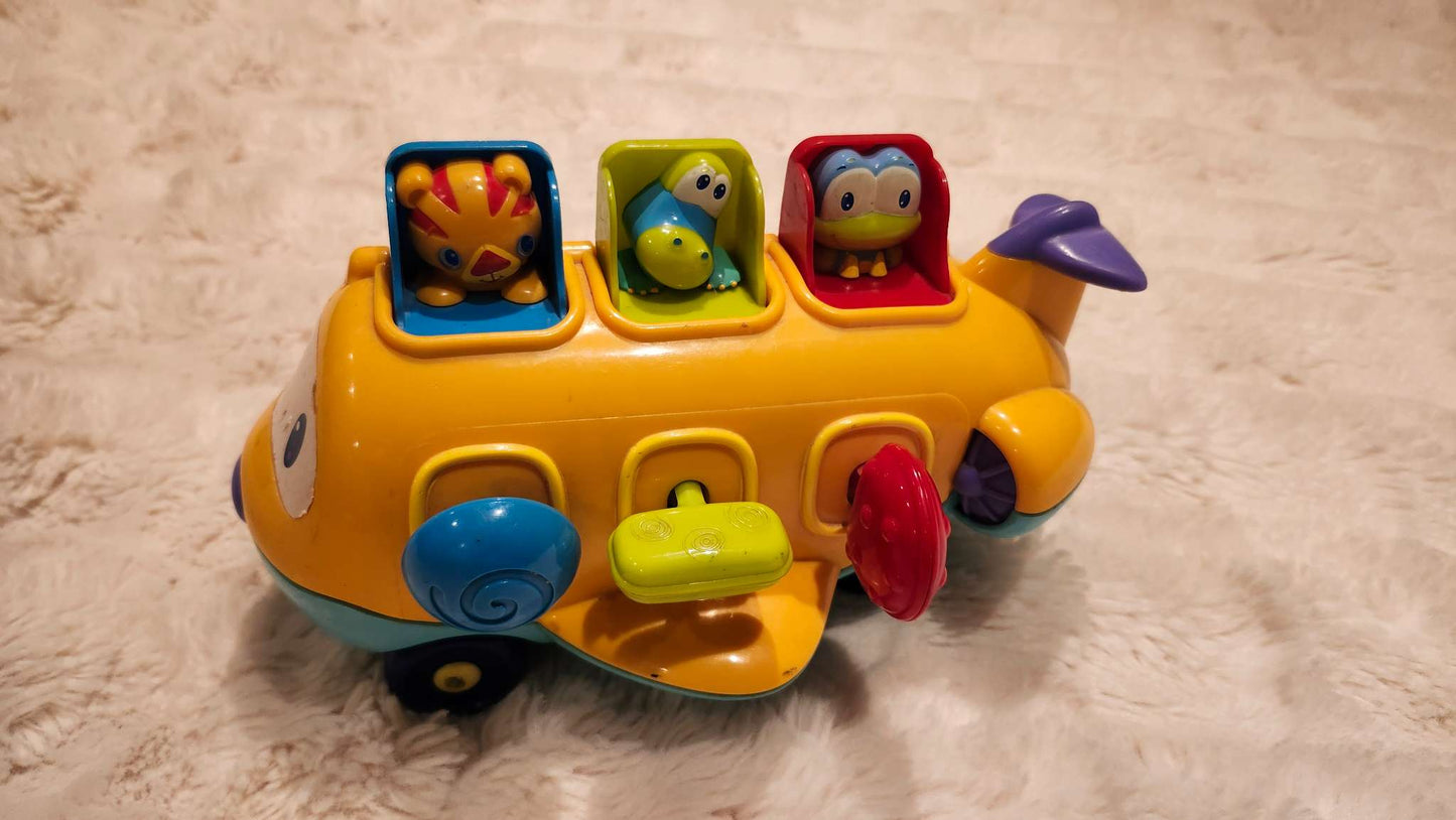 Bright Starts Pop-Up Airplane Music Toy