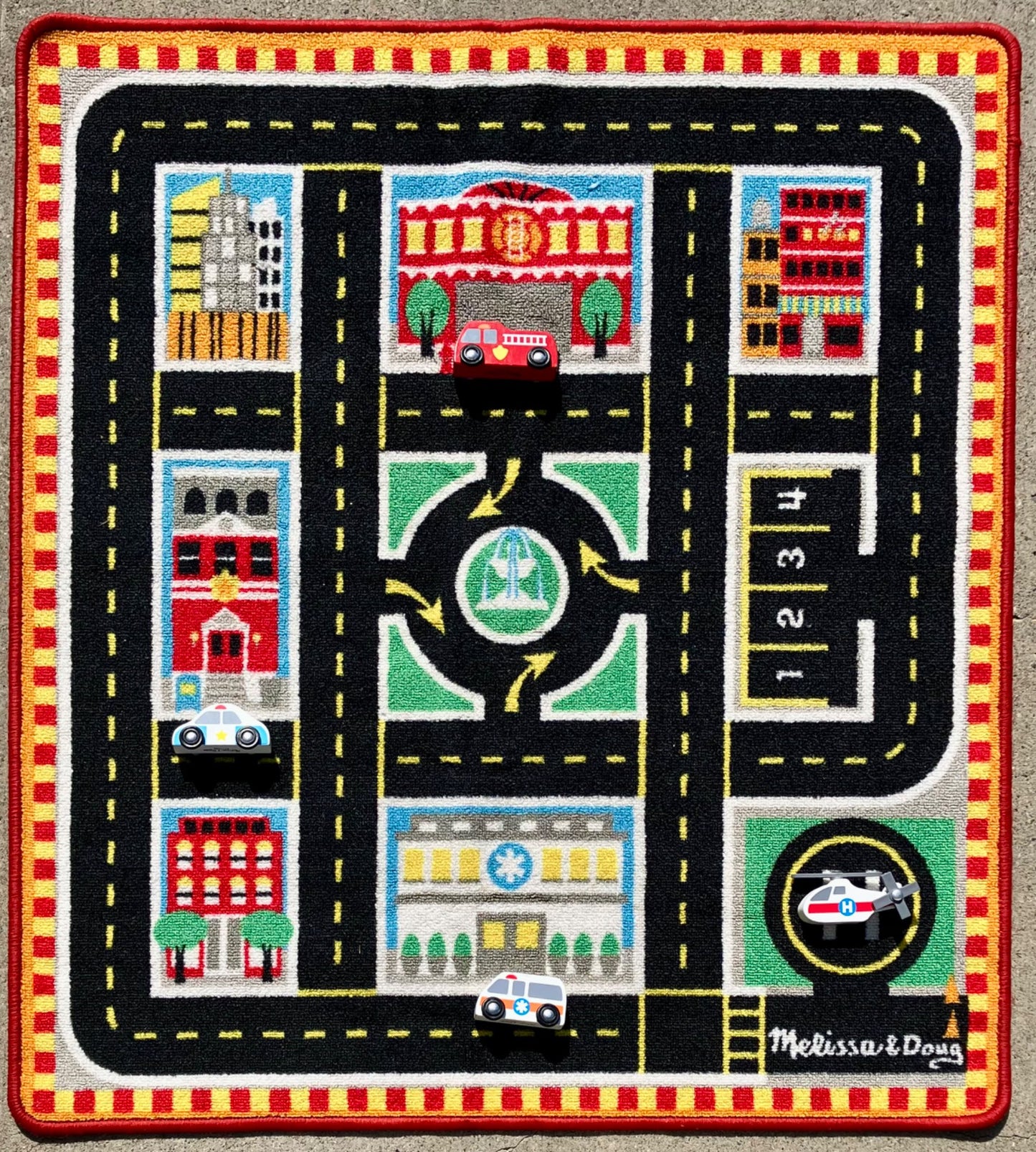 Melissa & Doug Round The City Rescue Rug with 4 Wooden Vehicles (39 x 36 inches)