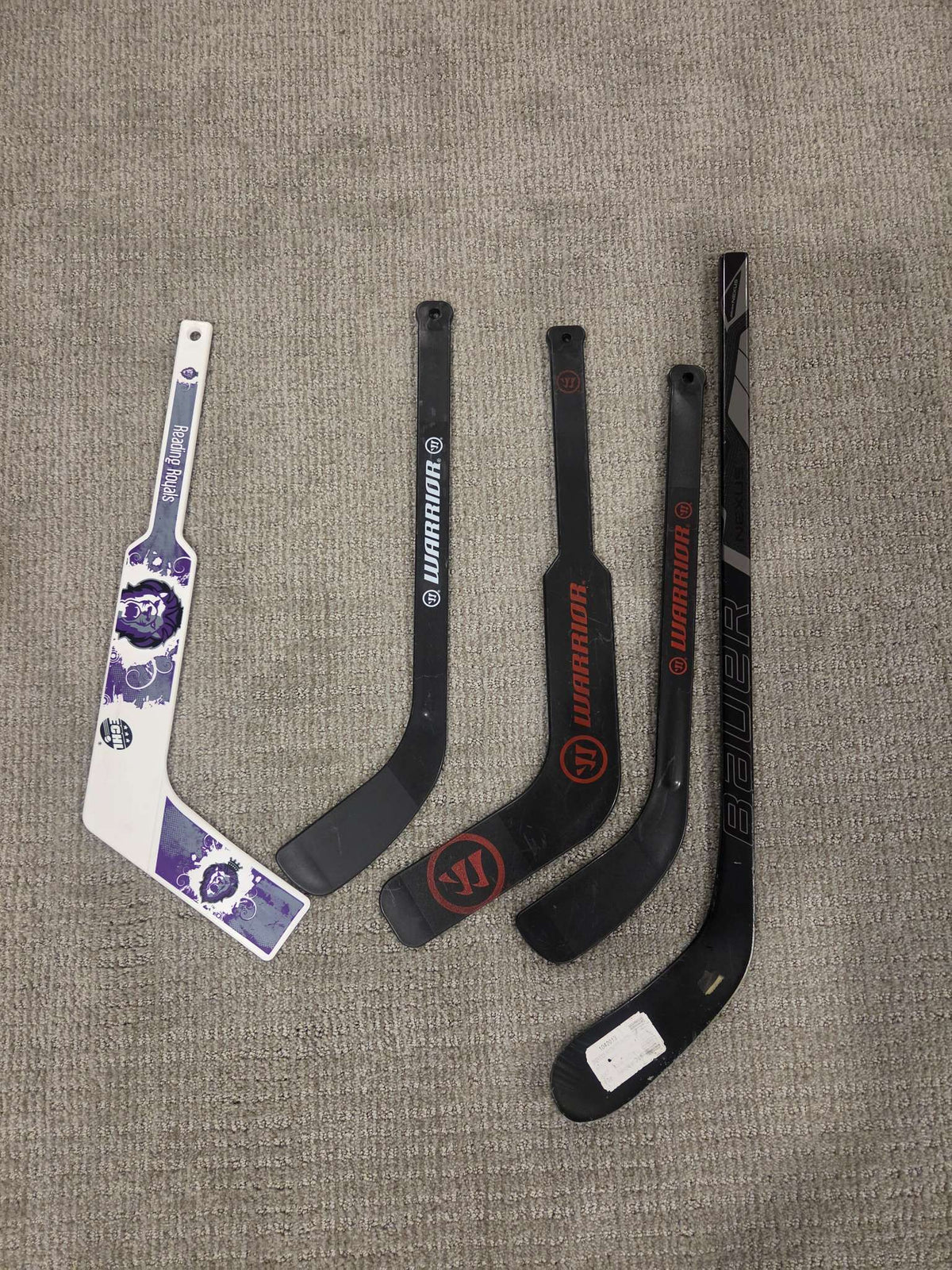 Five mini hockey sticks
