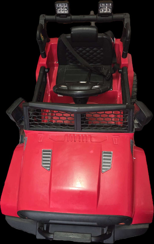 Red Ride-on Truck, with remote control and seatbelt, music, and headlights (Retails, $259.99)