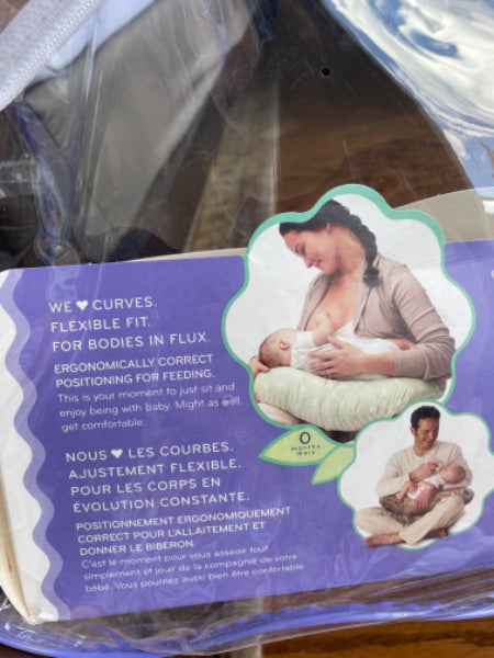 Boppy- nursing/feeding pillow and three covers