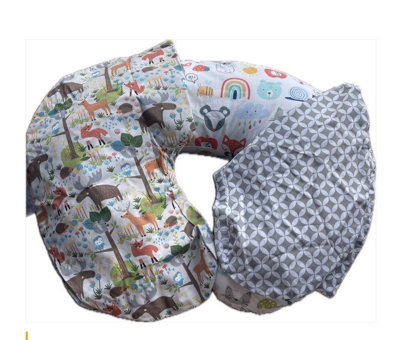 Boppy- nursing/feeding pillow and three covers