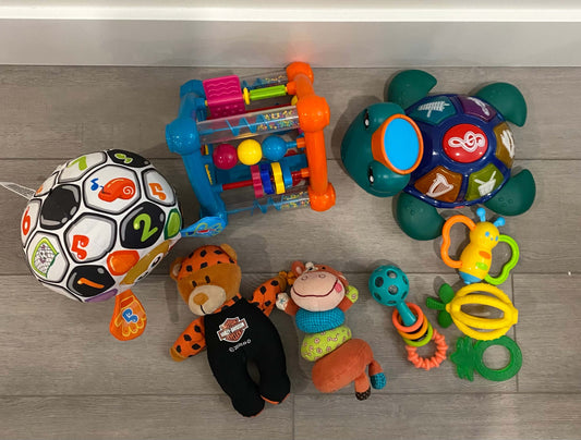 Baby toy bundle including baby Einstein music turtle