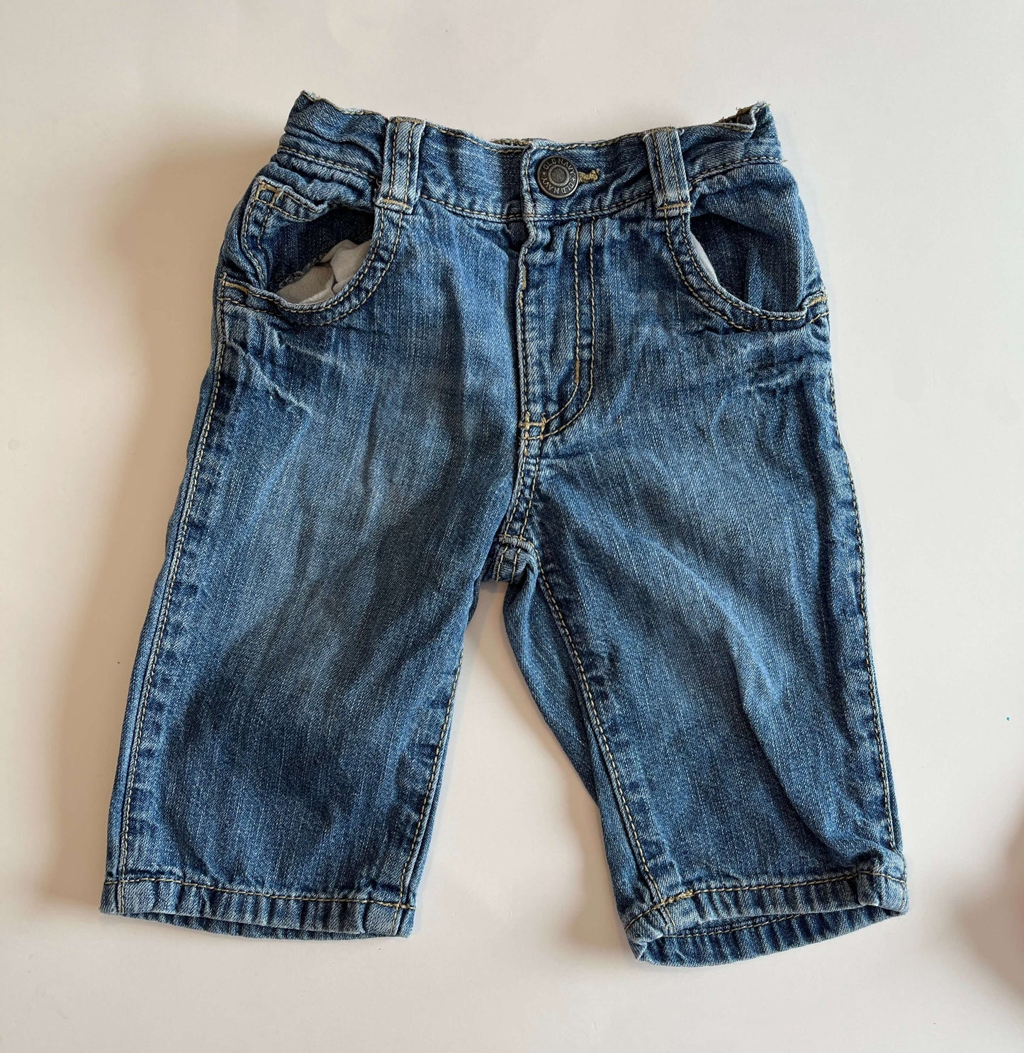 Set of girls' 3-month pants and long shorts:  Old Navy – Jeans, size 3-6 months Carter's – Leggings, size 3 months TU – Purple shorts, size 3-6 months, Kids 6 Month (3-6M)