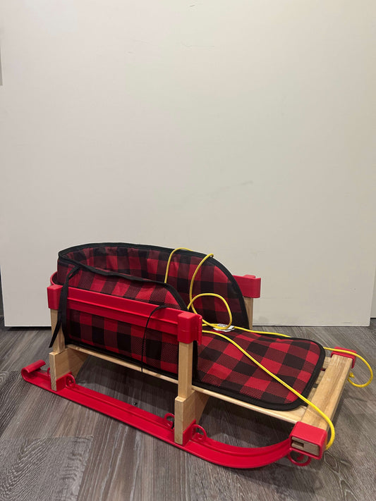 Sled with cushion insert and seatbelt