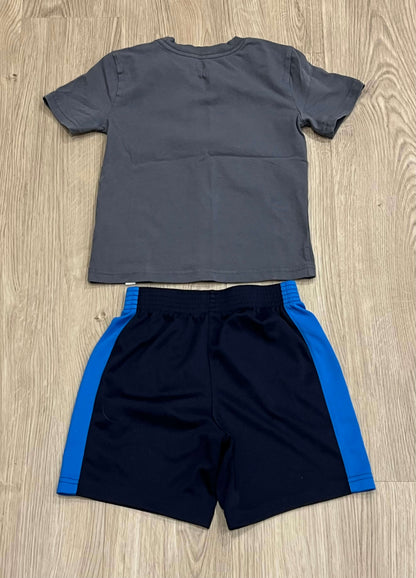 Boys Dinosaur skateboarding T-shirt size XS (4) from Tommy Bahamas matched with blue athletic shorts from The Children's Place (TCP) size 4T, VGUC, Kids 4/4T