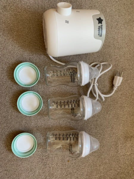 3 Tommee Tippee bottles and warmer.