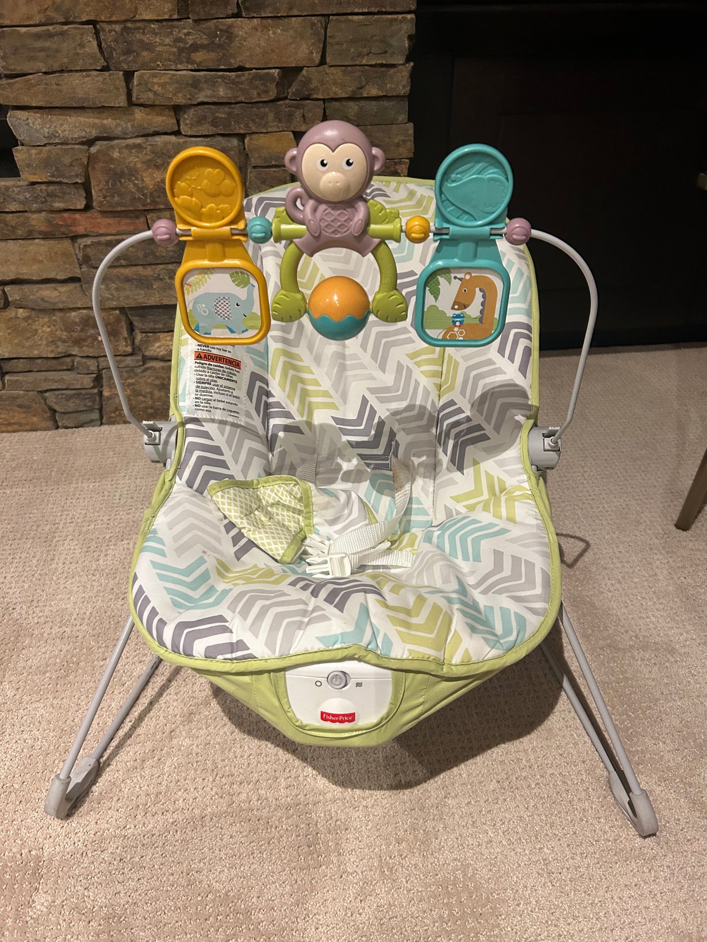 Fisher Price baby bouncer with toys and vibrating seat
