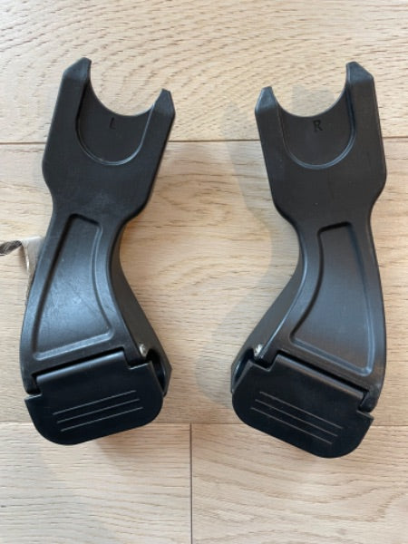 Car seat/stroller adapters