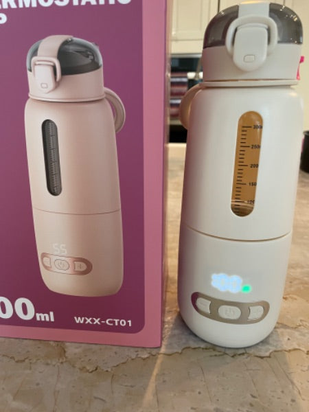 Portable Thermostatic Bottle for heating water or milk