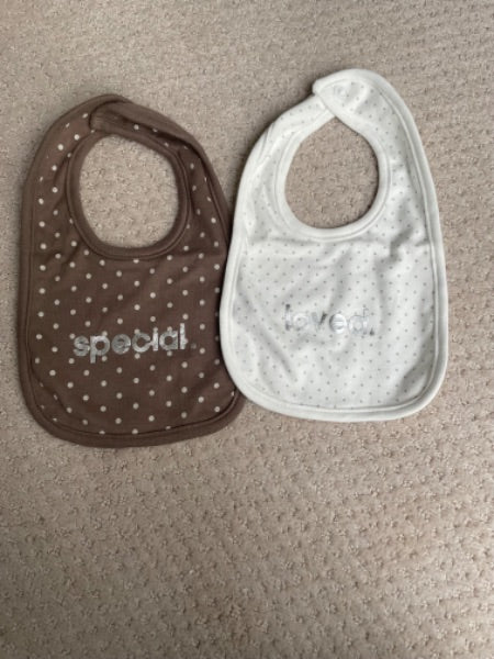 Set of two bibs, new