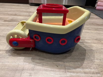 Large Bath toy boat.