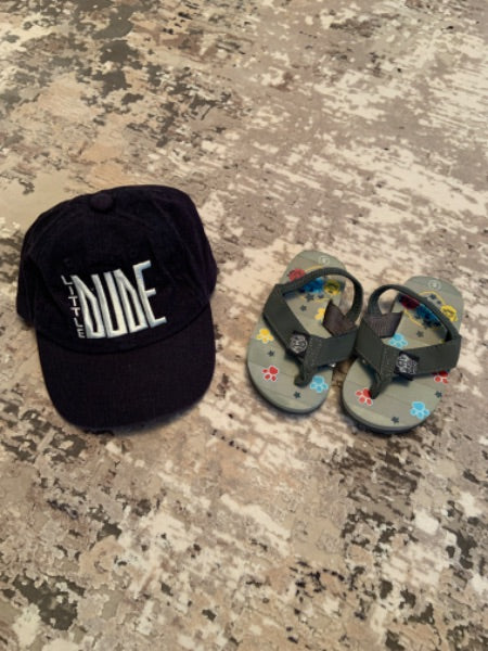 Joe fresh size 0-12m hat with size 5 paw patrol flip flop