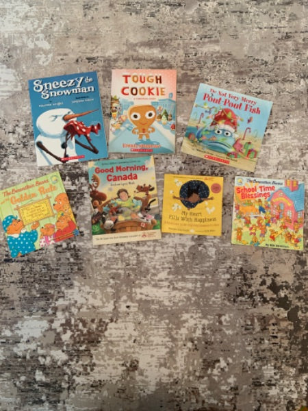 7 soft cover books Age 4-8 yrs