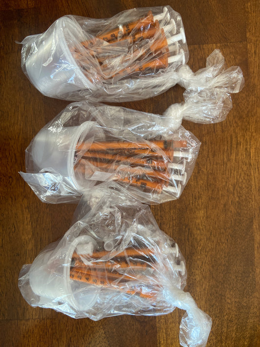 14 Unused Colostrum collection syringes (1 mL) with caps