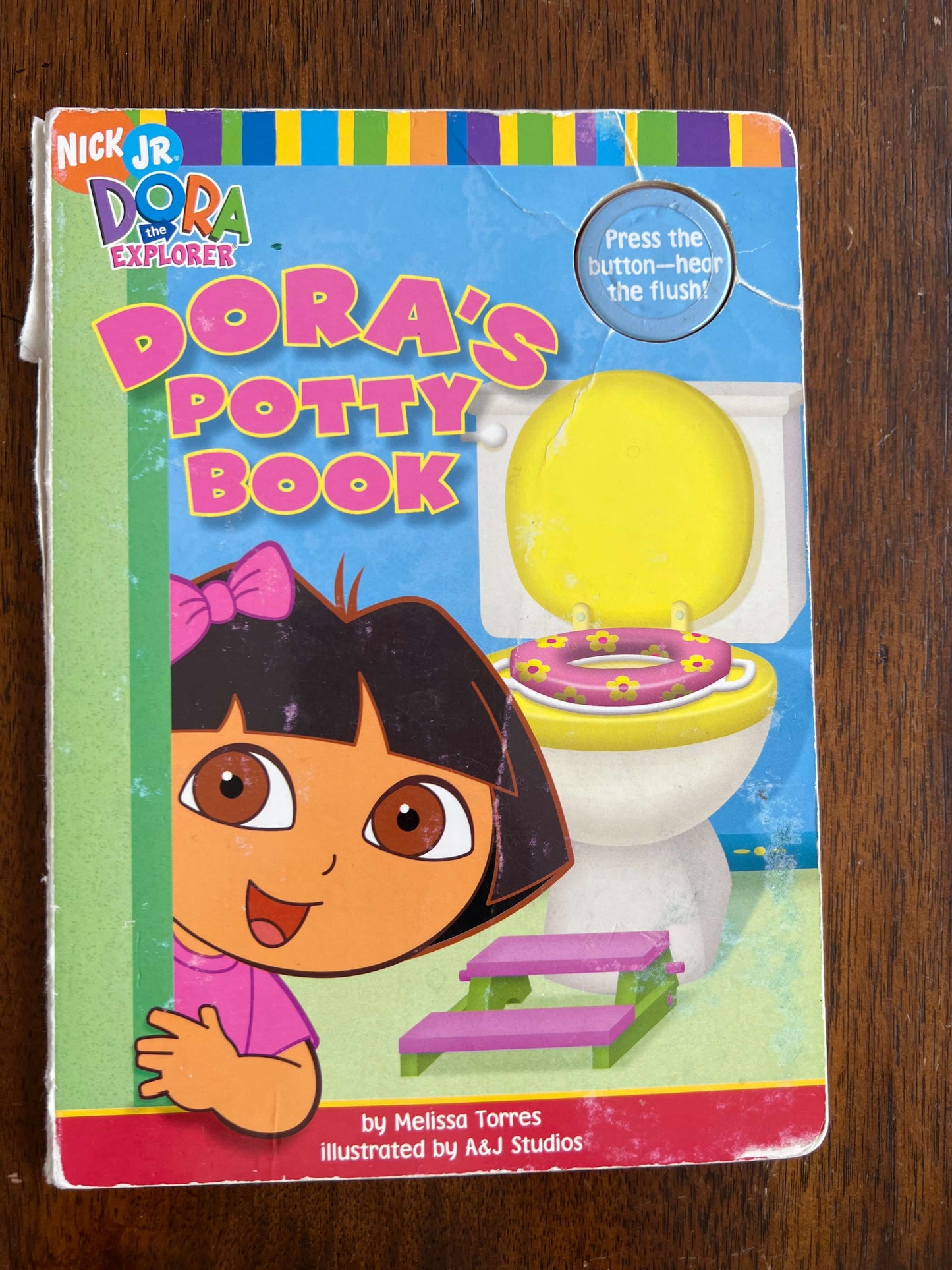 Dora potty book with button of sound of flushing toilet