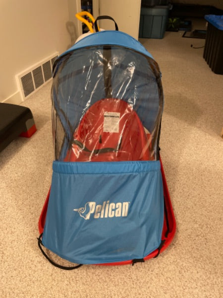 Pelican Baby Deluxe Sled with weather shield MSRP: $110